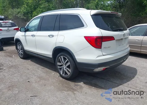 2018 Honda Pilot Elite z USA, uszkodzony, nr VIN 5FNYF6H03JB047552